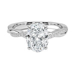 Four-claw cat-claw oval cut moissanite ring with a single pavé vine twist band in white gold ApolloGem.