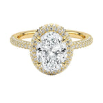 Oval brilliant moissanite engagement ring with a micro-pavé halo and triple-row shank ApolloGem.