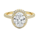 Oval brilliant moissanite engagement ring with a micro-pavé halo and triple-row shank ApolloGem.