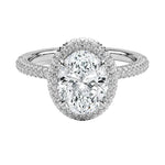 Oval brilliant moissanite engagement ring with a micro-pavé halo and triple-row shank ApolloGem.