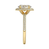 Symmetrical top-down view of an oval moissanite halo ring in polished yellow gold.