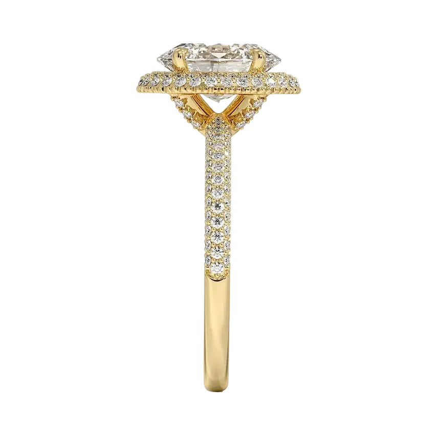 Symmetrical top-down view of an oval moissanite halo ring in polished yellow gold.