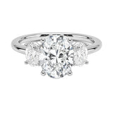 Oval brilliant cut moissanite trilogy engagement ring in white gold ApolloGem.