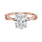 Oval brilliant moissanite engagement ring with a twisted infinity-style band ApolloGem.