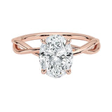 Oval brilliant moissanite engagement ring with a twisted infinity-style band ApolloGem.