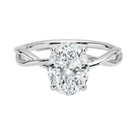Oval brilliant moissanite engagement ring with a twisted infinity-style band ApolloGem.