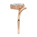 Detailed side view showing the suspended 4-prong setting and floating moissanite effect.