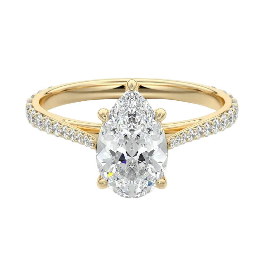  Sculpted five-claw pear cut moissanite cathedral ring with a tapered pavé gold band ApolloGem.