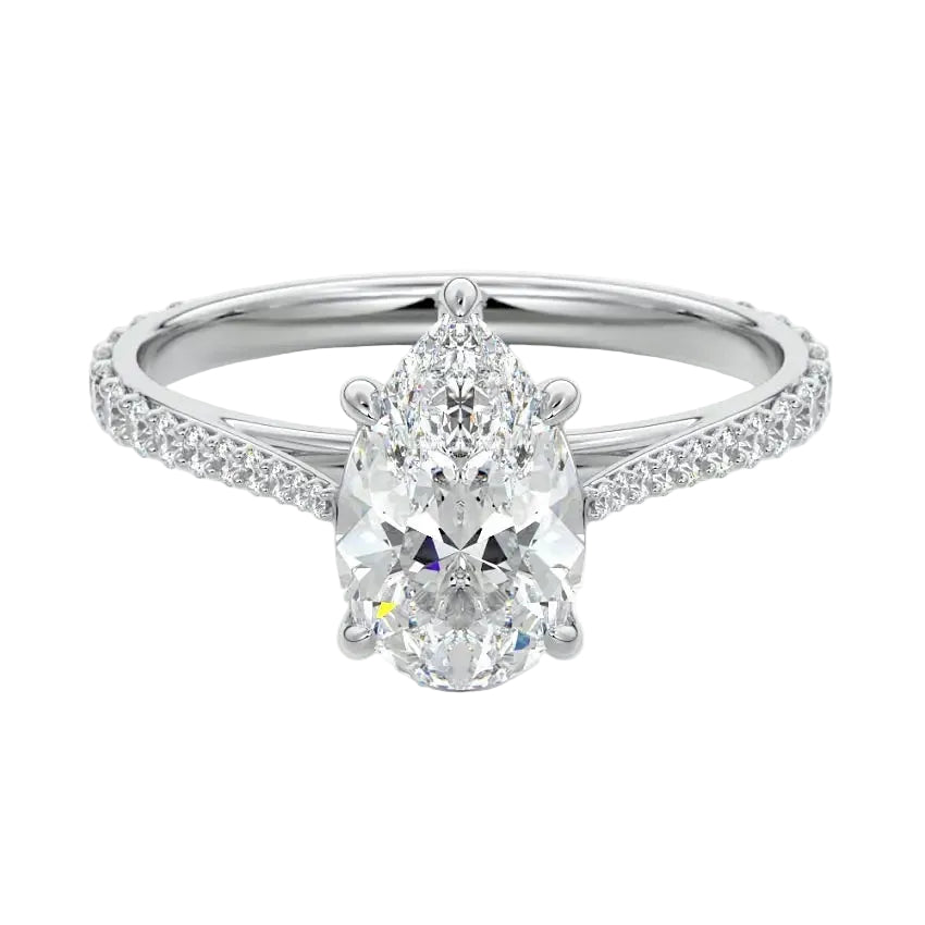 Sculpted five-claw pear cut moissanite cathedral ring with a tapered pavé gold band ApolloGem.
