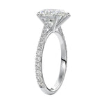 Top-down view of a D-color VVS1 pear stone in a White gold tapering pavé cathedral setting.