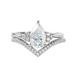 Pear cut moissanite engagement ring with matching chevron wedding band Duo Collection ApolloGem.