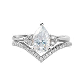 Pear cut moissanite engagement ring with matching chevron wedding band Duo Collection ApolloGem.