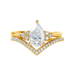 Pear cut moissanite engagement ring with matching chevron wedding band Duo Collection ApolloGem.