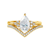 Pear cut moissanite engagement ring with matching chevron wedding band Duo Collection ApolloGem.