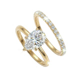 Pear brilliant moissanite solitaire engagement ring with a matching pavé eternity wedding band Duo Collection ApolloGem.