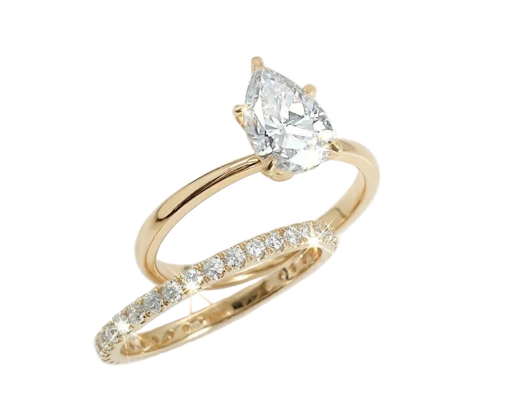 Close-up of a D-color VVS1 pear-cut moissanite demonstrating high-clarity facets and teardrop shape.