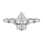 Luxury pear cut moissanite engagement ring in white gold with structural tapered baguette side stones ApolloGem South Africa.