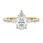 Secure three-prong pear cut moissanite ring with a half eternity triple marquise yellow gold band ApolloGem