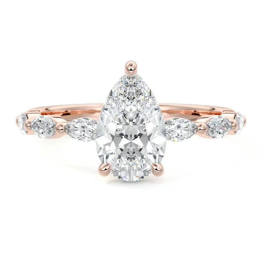 Secure three-prong pear cut moissanite ring with a half eternity triple marquise rose gold band ApolloGem