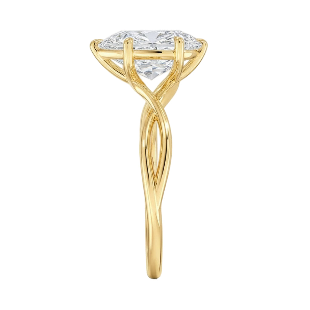 Side view of a five-prong pear shaped moissanite ring showing the protective V-prong and slim band
Pear cut Moissanite lab grown diamond engagement ring twisted shank with a six claw setting, on a gold band, against a white background.Moissanite engagement ring cape town south africa grand diamonds ralph jacobs jeulia  