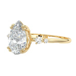 Side view of a pear shaped moissanite ring showing a protective V-prong setting and high-quality GRI certified stones.