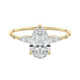 Pear cut moissanite engagement ring yellow gold marquise side stones botanical design