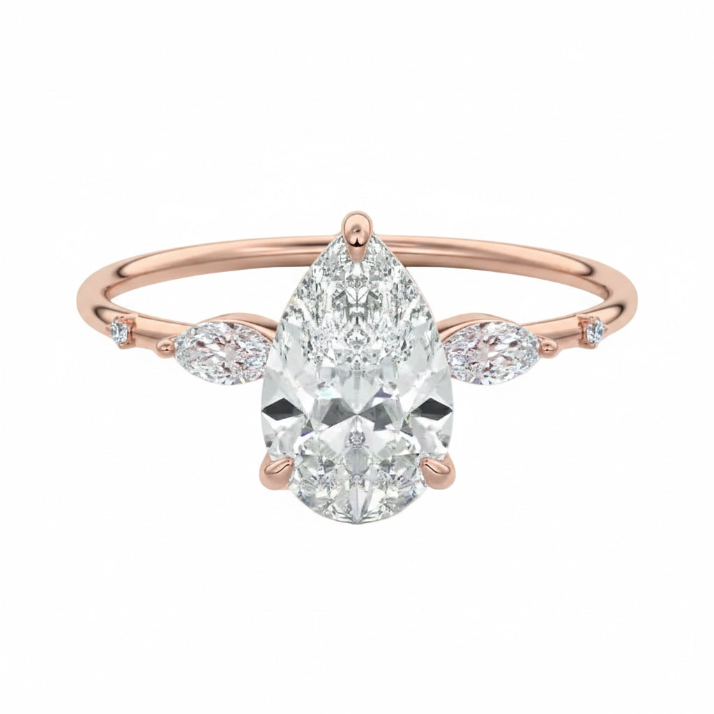 Pear cut moissanite engagement ring rose gold marquise side stones botanical design