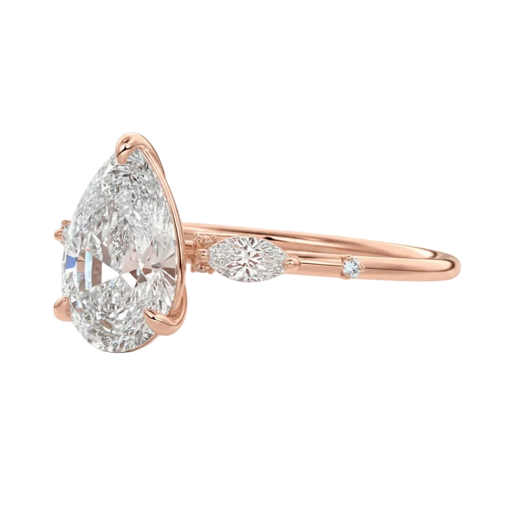 Nature inspired pear moissanite ring with leaf accents and slim band ApolloGem