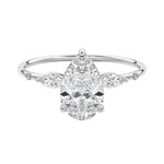 Pear cut moissanite engagement ring white gold marquise side stones botanical design