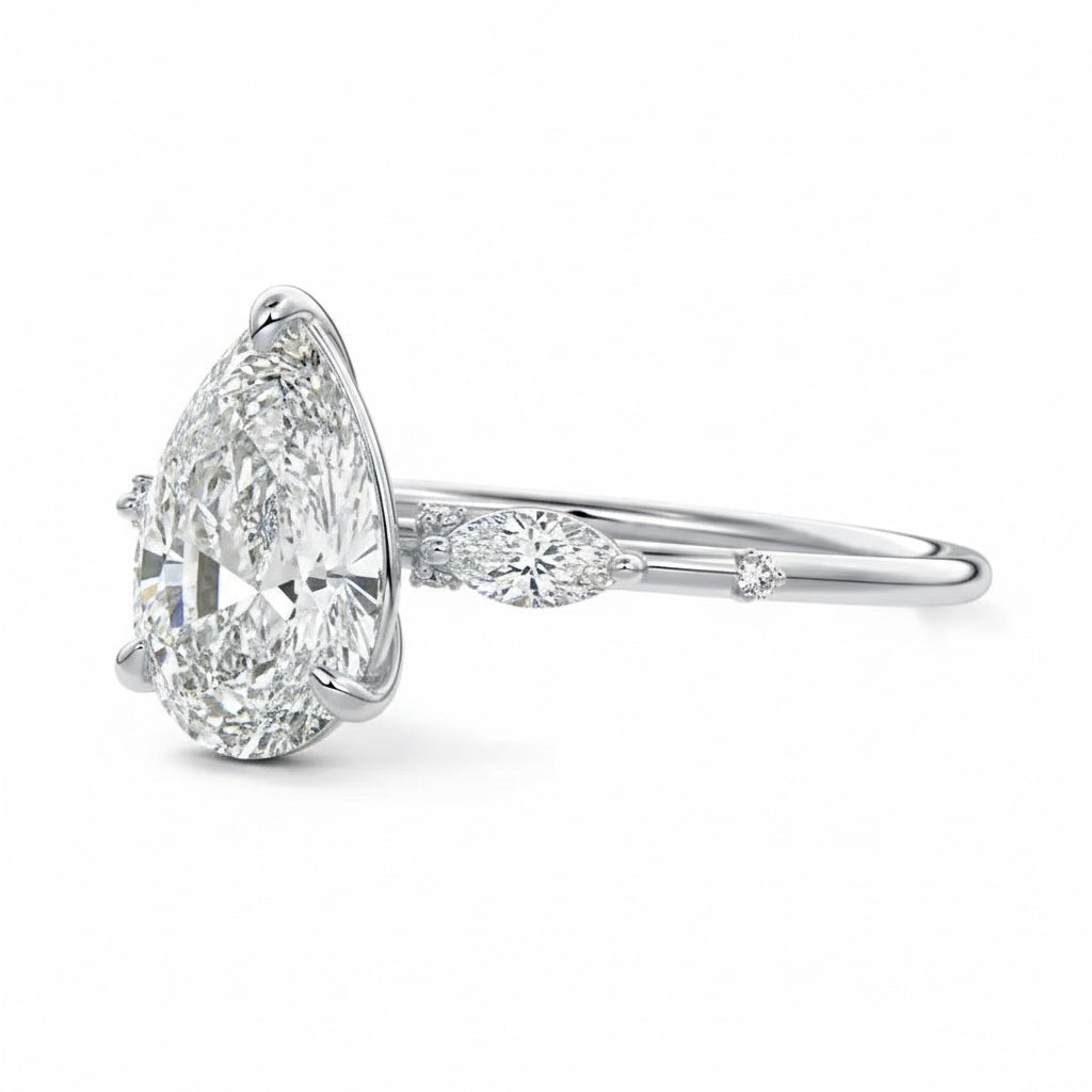 Dainty pear cut engagement ring side profile five prong setting details