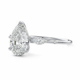 Dainty pear cut engagement ring side profile five prong setting details