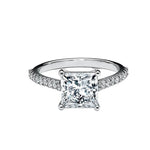Sculpted four-claw princess cut moissanite cathedral style engagement ring in white gold ApolloGem.