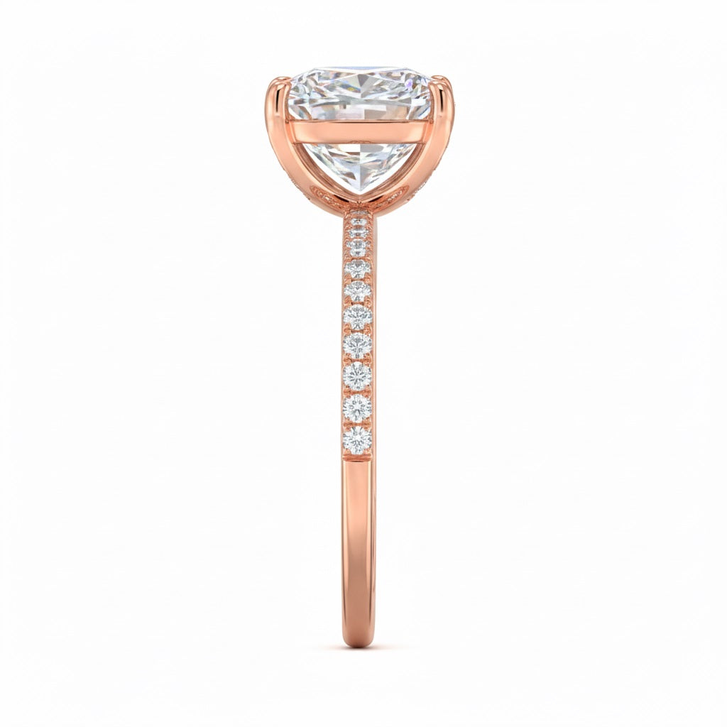 Top-down view of a D-color VVS1 princess stone in a rose gold uniform accented setting.