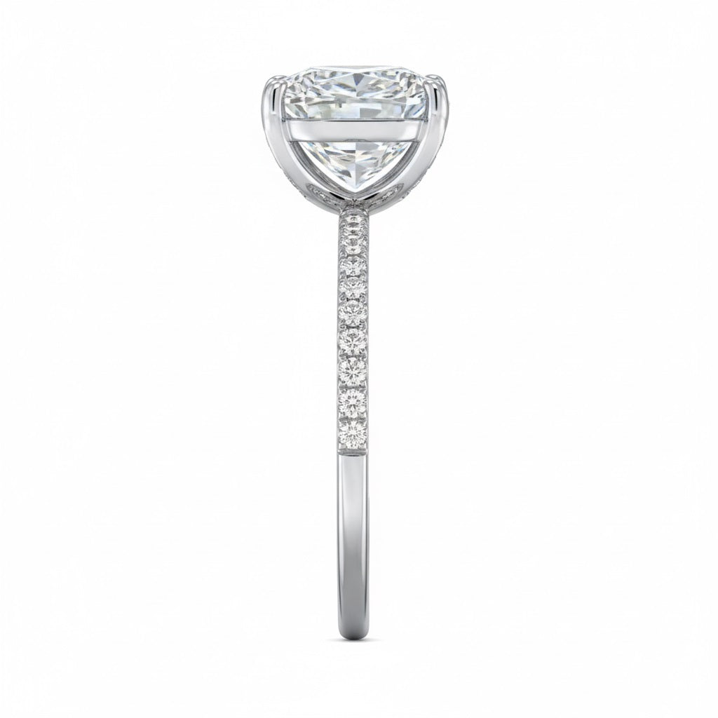 Top-down view of a D-color VVS1 princess stone in a white gold uniform accented setting.