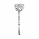 Top-down view of a D-color VVS1 princess stone in a white gold uniform accented setting.