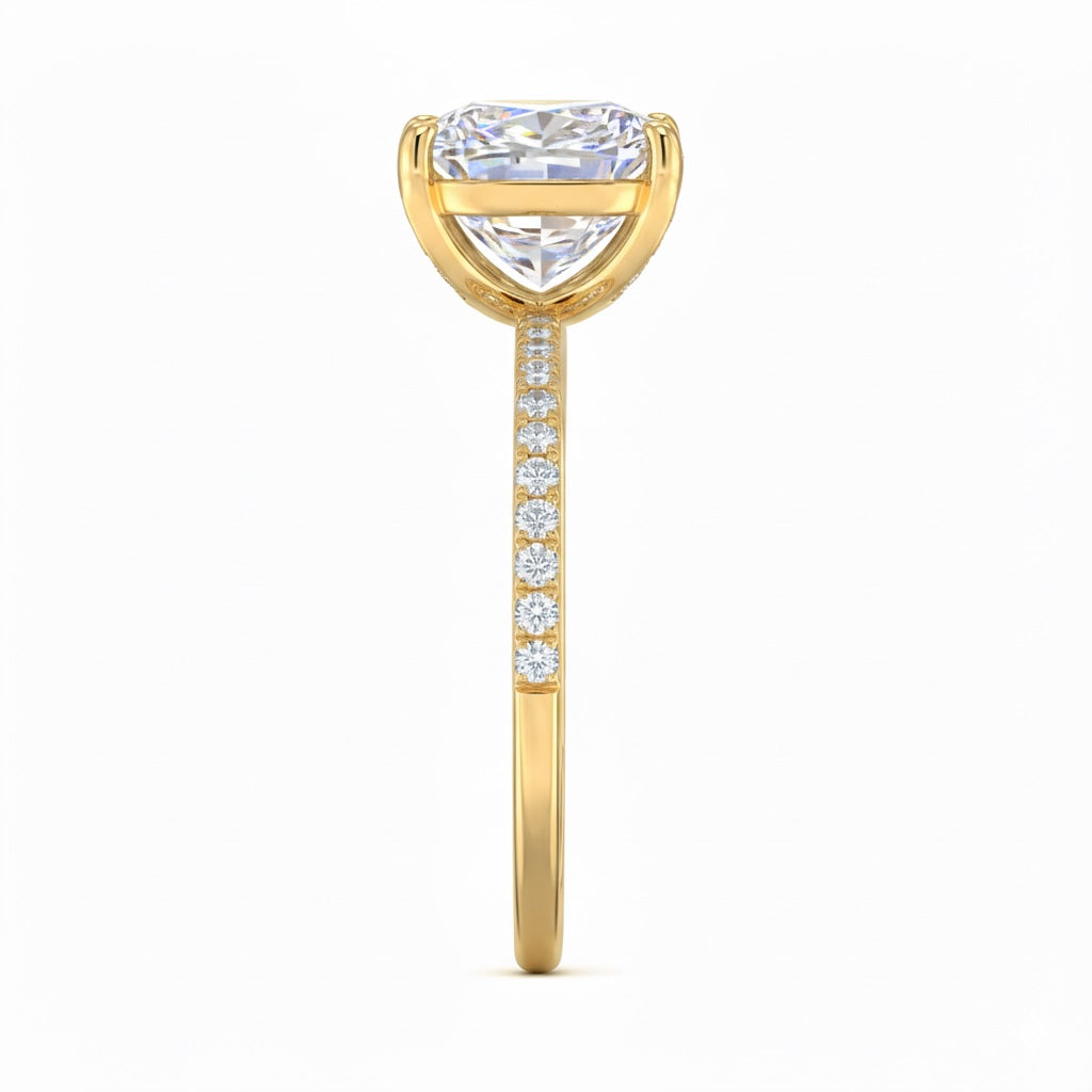 Top-down view of a D-color VVS1 princess stone in a yellow gold uniform accented setting.