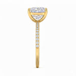 Top-down view of a D-color VVS1 princess stone in a yellow gold uniform accented setting.