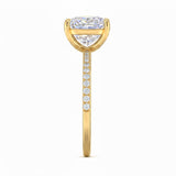 Top-down view of a D-color VVS1 princess stone in a yellow gold uniform accented setting.