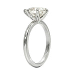 Diamond ring with a clear gemstone on a white background