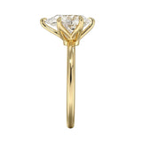 Six-prong pear cut solitaire engagement ring with a high-quality GRI certified moissanite stone.