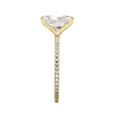 Top-down view of a D-color VVS1 radiant stone in a yellow gold 3/4 pavé setting