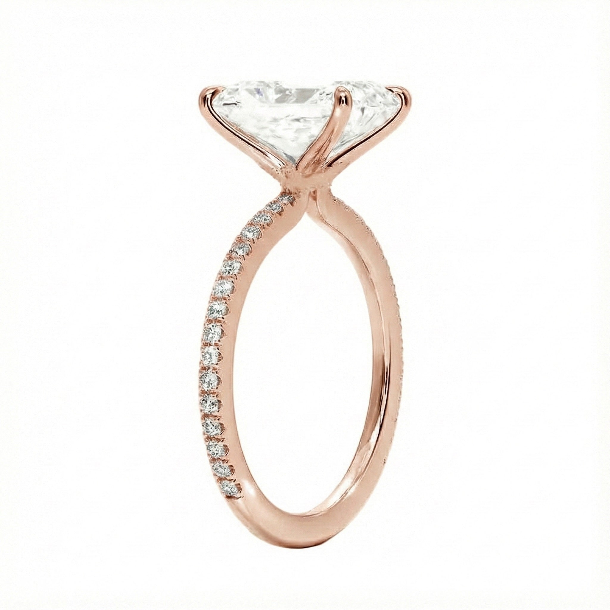 Side profile of the Radiant 3/4 Eternity ring showing the extended stone coverage and refined basket.