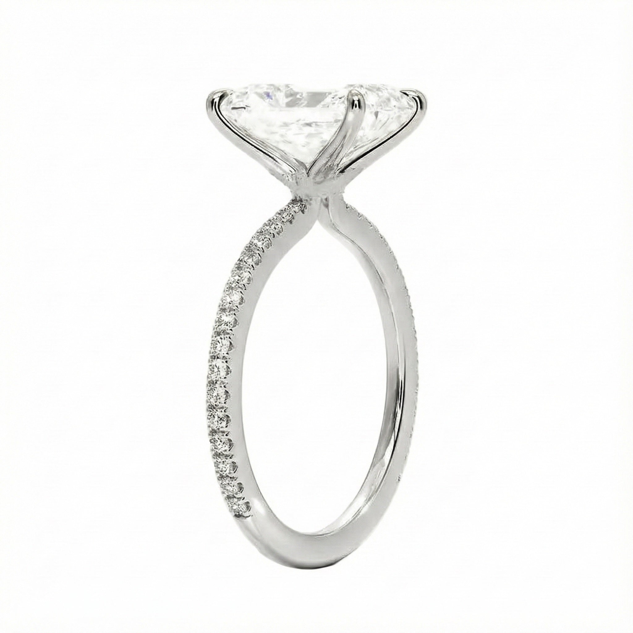 Side profile of the Radiant 3/4 Eternity ring showing the extended stone coverage and refined basket.