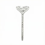 Top-down view of a D-color VVS1 radiant stone in a white gold 3/4 pavé setting