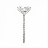Top-down view of a D-color VVS1 radiant stone in a white gold 3/4 pavé setting