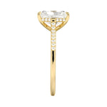 Close-up of the half-pave shank on a yellow gold radiant engagement ring