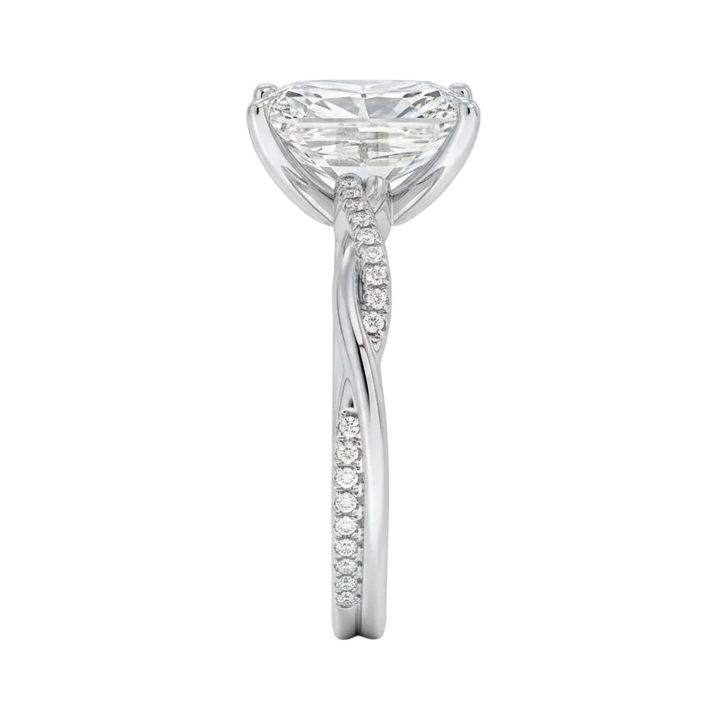 Top-down view of a D-color VVS1 radiant stone in a white gold infinity twist setting.