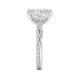 Top-down view of a D-color VVS1 radiant stone in a white gold infinity twist setting.