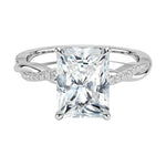 Four-claw radiant cut moissanite engagement ring with a pavé infinity twist vine band in white gold ApolloGem.