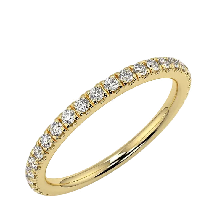 Scattered-style round brilliant moissanite 3/4 eternity band in yellow gold ApolloGem.
